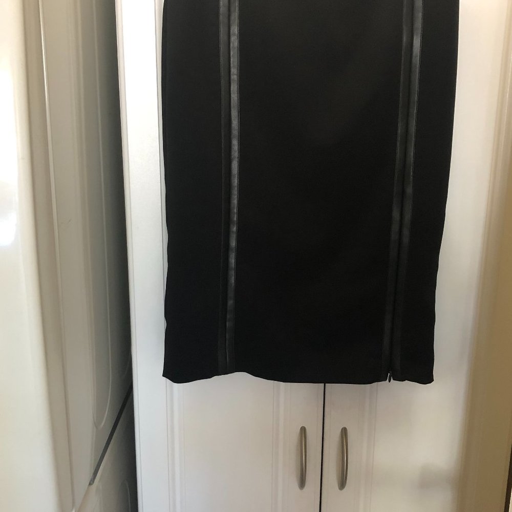 Encounter Black pencil skirt that has leather on both sides, size 6.